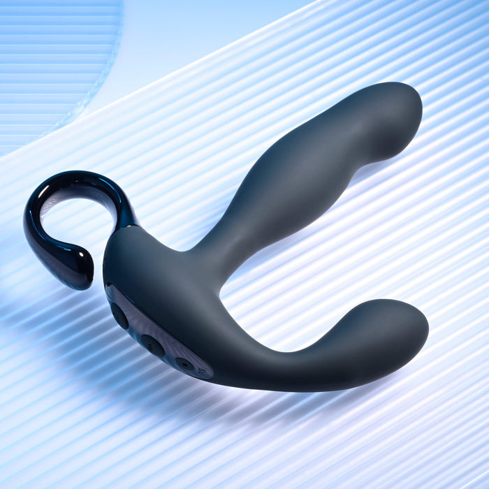 The Playboy Come Hither Motion Vibrating Prostate Massager by Evolved Novelties, a sleek black device featuring a curved hook for easy handling and 10 vibration speeds, rests on a textured light blue surface.