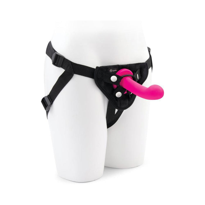 A mannequin wears the Pop Strap on Dildo & Harness Set in pink silicone (5 inches), featuring adjustable hip and thigh straps and a vibrant silicone dildo secured at the front.