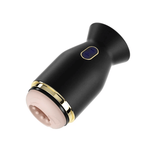 The Priti Automatic Rotating Penis Masturbator, in black and gold with a pink, textured silicone opening and side control button, designed for stamina training, is photographed on a white background.