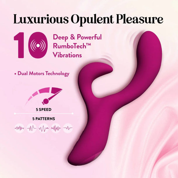 The Quinn Warming G-Spot Rabbit Vibrator, in pink, features dual motors, 10 powerful RumboTech™ vibrations, 5 speeds and patterns, warming function, and body-safe silicone—all set against a soft backdrop for luxurious pleasure.