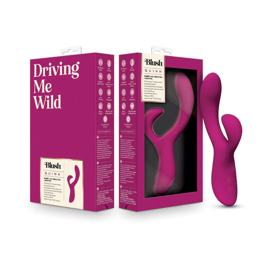 The Quinn Warming G-Spot Rabbit Vibrator in purple features a curved design and is shown beside its packaging labeled "Driving Me Wild" and "Blush Quinn." Made of body-safe silicone, the toy is visible through a clear window on the box.