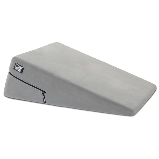 The Liberator Ramp – Intimate Positioning Support Cushion 24 Inches is a gray foam wedge pillow with a zippered, removable cover, designed for comfort and support, ideal as a sex position pillow for deeper penetration.