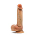 The Raphael Ultra Realistic 9.5 Inch Silicone Dildo with Sliding Foreskin - Caramel, by Blush, is crafted from liquid silicone and stands upright with a suction base. It features a veined shaft, detailed glans, and textured testicles for an exceptionally realistic erection, making it ideal for adult use.