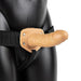 Caramel Realrock 6 Inch Hollow Dildo & Strap-on Harness on a black mannequin on a white background