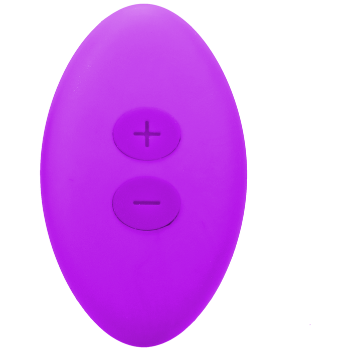 A purple, oval-shaped remote control by Doc Johnson, featuring a plus (+) and minus (-) button on its front surface for adjusting settings, included with the Remote Controlled Panty Vibrator for Beginners in a Bag.