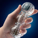 Rize Feelz Clear Textured Stroker held in hand 