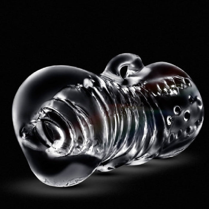 Rize Squeezy Clear Textured Stroker sideways on black background