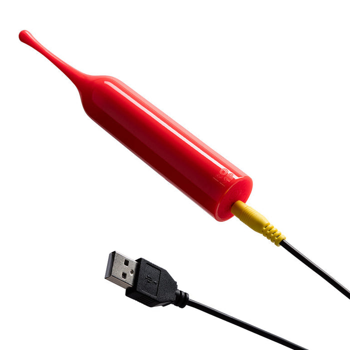 The Romp Pop Pinpoint Clitoral Stimulator with 2 Heads, in red with a rounded tip, is attached to a black USB cable via a yellow connector, displayed on a white background.