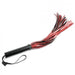 Saffron Flogger by Sportsheets black and red flogger on an angle on white background 