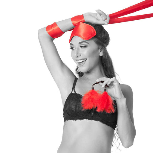 Sex & Side view of model wearing Mischief Amor Beginner Red Bondage Kit