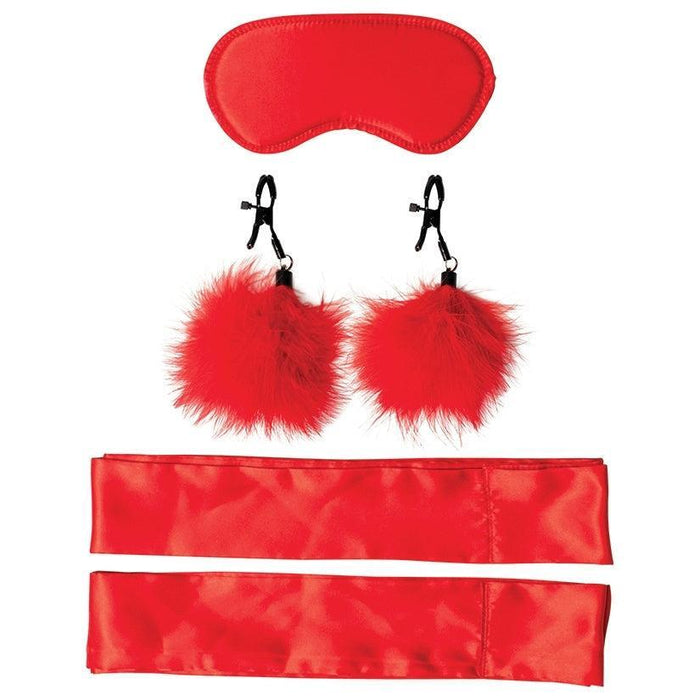 The Sex & Mischief Amor Beginner Red Bondage Kit by Sportsheets includes a red satin blindfold, a pair of red feather nipple clamps, and two red silk restraints, all arranged delicately on a white background.