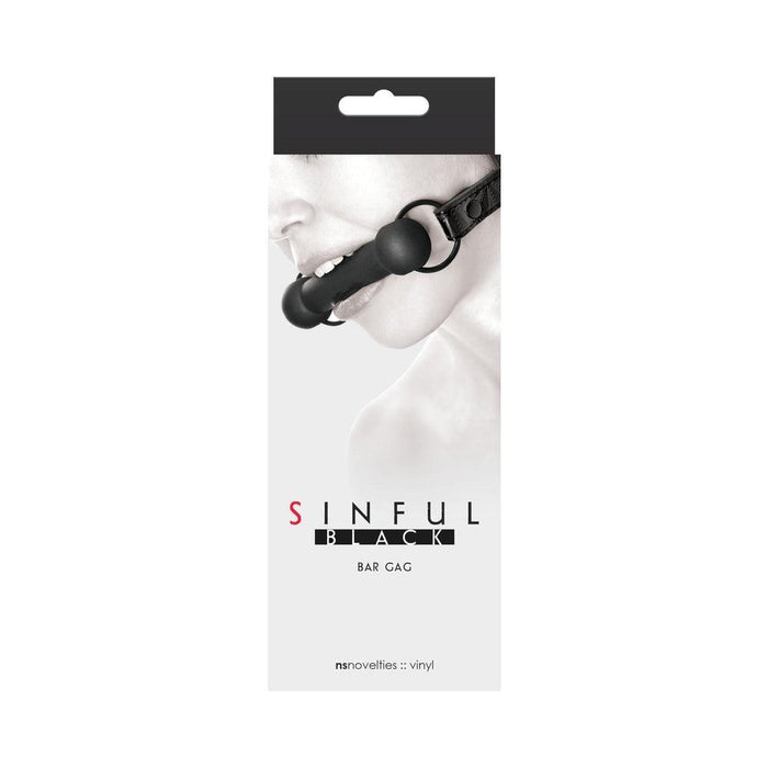 A monochrome packaging image displays a person wearing the "Sinful Silicone Bar Gag" by NSnovelties, with an adjustable vinyl strap and nickel-free hardware. The background is light gray, and the product and brand names are in bold text.