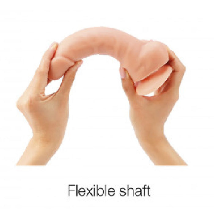 A pair of human hands bending a Lovely Planet Sliding Skin Realistic Small 7 Inch Vanilla Silicone Dildo with Suction Cup to demonstrate its malleability and durability.