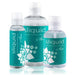 Image shows three bottles of Sliquid Naturals Sea - Water Based Lubricant. The bottles come in different sizes, adorned with teal labels featuring white text and designs, and capped with clear tops. Infused with natural seaweed extracts for enhanced hydration, the prominent Sliquid logo—a stylized flower—graces each label.