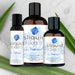 The image features three bottles of Sliquid Organics Natural Aloe Based Lubricant from the brand Sliquid. These glycerin and paraben-free lubricants are made with 95% organic ingredients. The lineup includes different sizes, with the largest bottle positioned in the back and two smaller ones in front.
