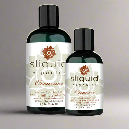 Two bottles of Sliquid Organics Oceanics Aloe Based Lubricant by Sliquid are pictured. The larger bottle is 8.5 fl oz (255 ml), and the smaller one is 4.2 fl oz (125 ml). These glycerine- and paraben-free lubricants, enriched with natural seaweed extracts like carrageenan from red algae, are suitable for intimate use.