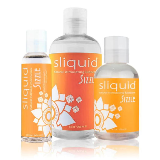 Three bottles of Sliquid Sizzle Natural Stimulating Lubricant, featuring orange and white labels in different sizes, are displayed side by side on a white background.