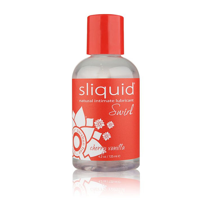 A 4.2 oz (125 mL) clear plastic bottle with a red label and cap, containing "Sliquid Swirl Cherry Vanilla Flavored Lubricant." The label features decorative floral designs and text indicating the flavor as "creamy sweet cherries." This vegan-friendly lubricant from Sliquid is pH balanced neutral.