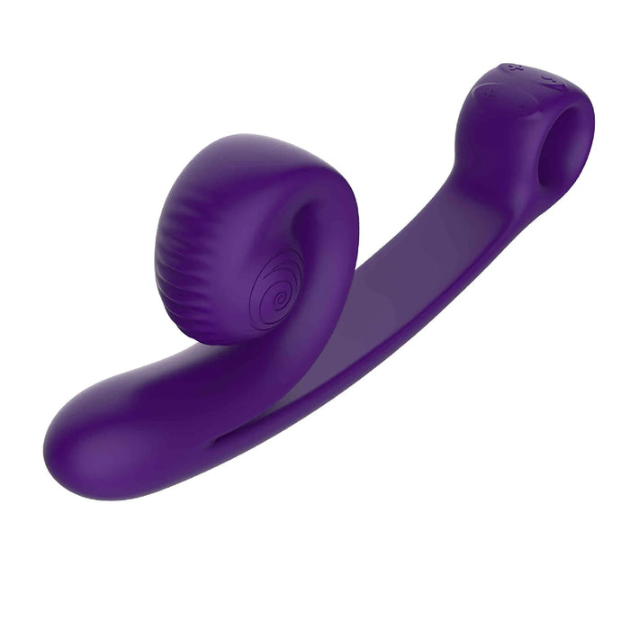 The Snail Vibe Curve Ultra Powerful 2 Motor Dual Stimulating Vibrator in purple features a sleek, curved design with one bulbous end and textured ridges. Each end boasts a unique shape, potentially catering to targeted stimulation. Crafted from smooth, flexible material, the vibrator’s ergonomic form ensures enhanced comfort during use.