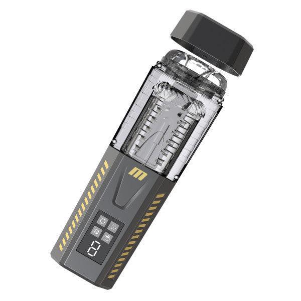 The Spin Master Pro Vibrating, Stroking, Rotating, Automatic Stroker by Blush is a high-tech cylindrical gadget with a transparent central chamber and a dark base featuring various buttons and a digital display. The device boasts multiple vibration modes and 360° rotation. Slightly tilted, the top cap appears to be detached and floating above it.