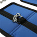 Close-up of a blue fabric strap featuring a silver metal carabiner clipped onto a black loop, part of the Sportsheets The Original Bed Bondage Sheet - King Size system. The fabric is stitched with black thread, and part of another blue and black strap is visible in the background.