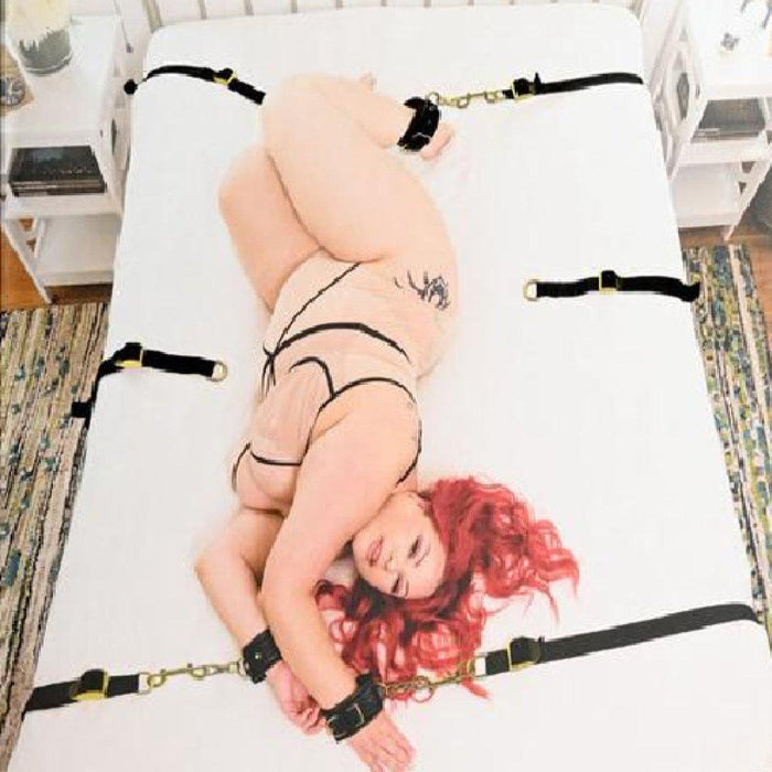 Sportsheets Under the Bed Restraint Set - Special Edition used by a model on a bed