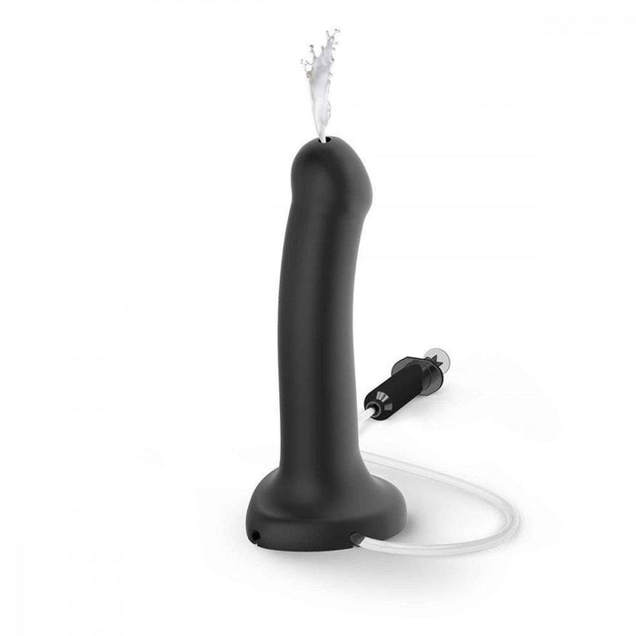 Introducing the Strap-On-Me 7.5 Inch Silicone Squirting Cum Dildo in Black from Lovely Planet. Perfect for those exploring strap-on play, this sleek and modern dildo features an attached tubing and a detachable nozzle with a control attachment at the end, making it easy to fill with water and providing ultimate stability with its flat, broad base. Designed to complement various aspects of gender expression, this product enhances every intimate experience.