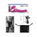 Image of a pink Strap-on-Me Multi Orgasm Bendable Strap-on with Clitoral Tongue - Large, by Lovely Planet, displayed in front of its packaging. The kit includes the strap-on, a wireless remote control, a starter guide, a black storage pouch, a USB charging cable, and a black strap-on harness for enhanced clitoral stimulation.