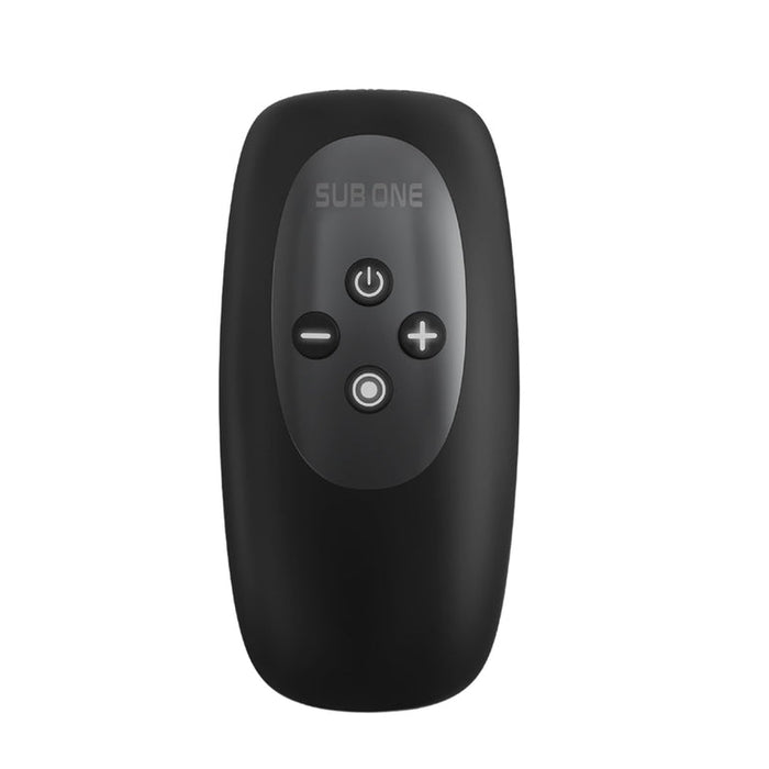 The Sub One Tapping Penis Stroker and Frenulum Teaser is a sleek black remote control made from flexible silicone, featuring five buttons: power, circle, plus, minus, and central. The brand name "SUB ONE" is elegantly displayed above the buttons for durability and modern decor appeal.