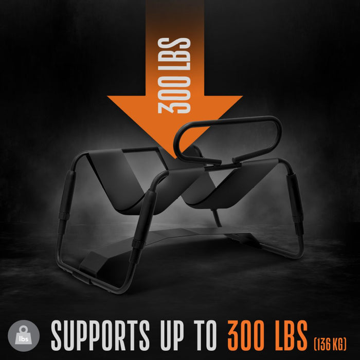 Promotional image of a **Surrender Sex Chair with 8 Inch Vibrating Dildo** by **blush**, designed for versatile training. The background is black with fog effects. An orange arrow points downwards with "300 LBS" text, and the bottom text says, "Supports up to 300 lbs (136 kg)." Features an adjustable lifting system for versatile training.