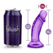 A purple soda can labeled "blush" is shown next to the Sweet n Small Beginner 4 Inch Dildo with Suction Cup in purple. The translucent dildo, ideal for shallow penetration, features an insertable length of 3.75 inches, a total length of 4.5 inches, and a diameter of 1.25 inches. It also includes a strong suction cup for versatile use.