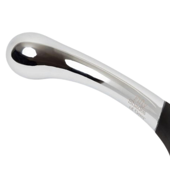Close-up of the Sweet Pressure Metal & Silicone Double Ended Dildo, showcasing its shiny curved metal design and smooth surface, with a black silicone section visible at the bottom right.