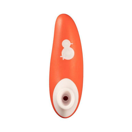 Image shows the WOW Switch Beginner's Pleasure Air Clitoral Stimulator, an orange and white device designed for personal care and pleasure. It features clitoral suction, a small circular button on the front, and a round opening at the bottom. The design is streamlined and ergonomic.