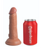A realistic King Cock Elite 6" Vibrating Silicone Dual Density Dildo - Caramel standing upright next to a red can labeled 'Pipedream Products' on a white background.