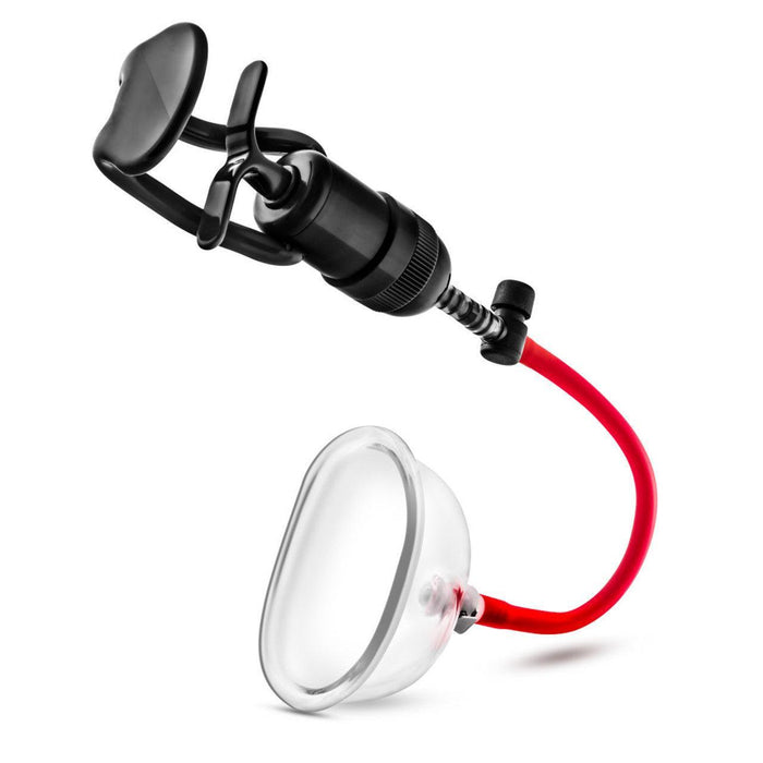 The Temptasia Intense Pussy Pump System by Blush features a black handheld vacuum pump designed for clitoris enhancement and vaginal pumping. It connects to a clear, oval-shaped suction cup via a red tube. The pump includes a manual handle and an adjustable valve, while the transparent cup is crafted for an airtight seal. The background is white.