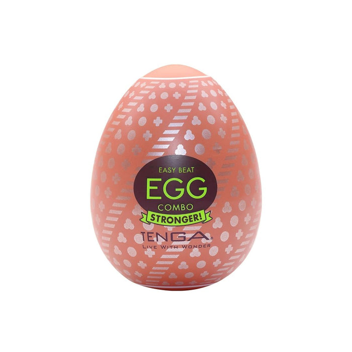 A patterned orange egg-shaped object from the Tenga Egg Disposable Penis Masturbator - Combo with green and black labeling.
