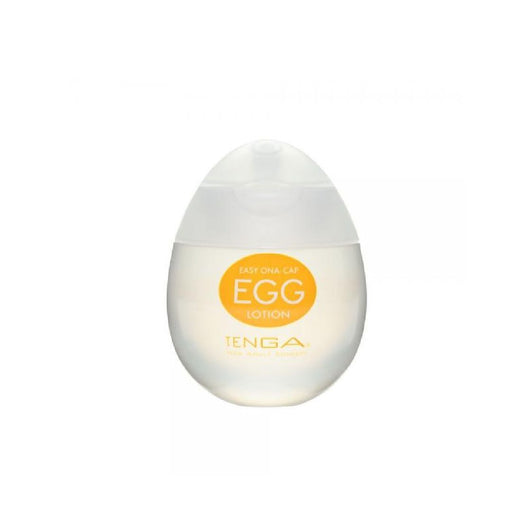Image of a white, egg-shaped container of "Tenga Egg Disposable Penis Masturbator - Lotion" with an orange label. The container features a clear lower half and a frosted white upper half, showcasing the unique texture inside. The text "Easy Ona-Cap" is visible on the label, indicating its use as a disposable masturbation sleeve.