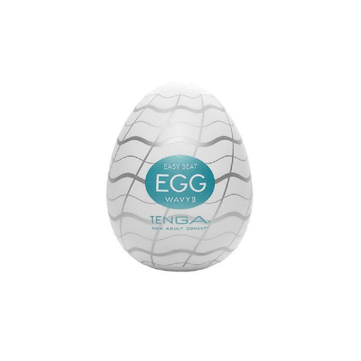 A Tenga Egg Disposable Penis Masturbator - Wavy 2, shown against a white background. The egg-shaped Tenga product is white with gray wave patterns and features a turquoise label in the center. Perfect as a travel buddy, this disposable masturbation sleeve ensures convenience on the go.