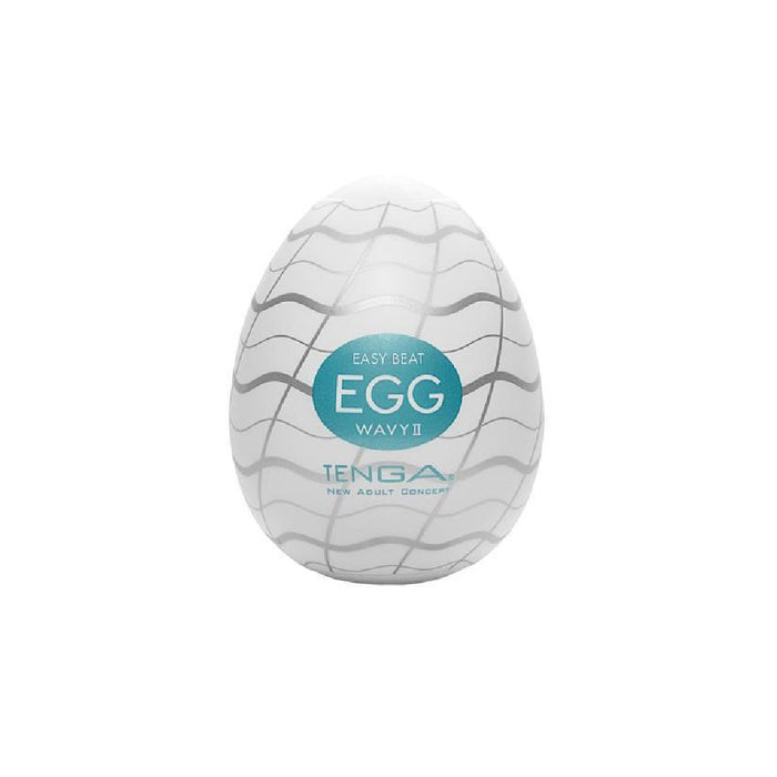 A Tenga Egg Disposable Penis Masturbator - Wavy 2, shown against a white background. The egg-shaped Tenga product is white with gray wave patterns and features a turquoise label in the center. Perfect as a travel buddy, this disposable masturbation sleeve ensures convenience on the go.