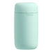 A mint green cylindrical container with rounded edges, featuring the brand name "Tenga" and the text "New Adult Concept" in small letters near the top. The Tenga Puffy Discreet Ultra Soft Beaded Masturbator - Mint Green's ultra-soft spongy material ensures comfort, and it's easy to clean and maintain for prolonged use.