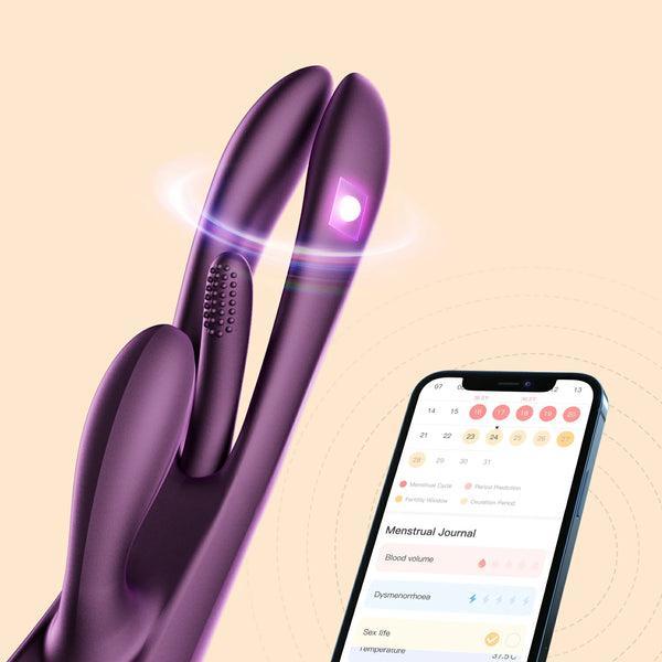 The Terri App-Controlled G-Spot Tapping Rabbit Vibrator in purple features dual tips and emits a glowing light, shown beside a smartphone with a menstrual tracking app on a beige background with subtle circular patterns.