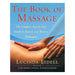 The Book of Massage: Step by Step Guide to Eastern and Western Techniques" by Lucinda Lidell features hands massaging a back, symbolizing healing. The bold red title contrasts a sky blue and sandy background.