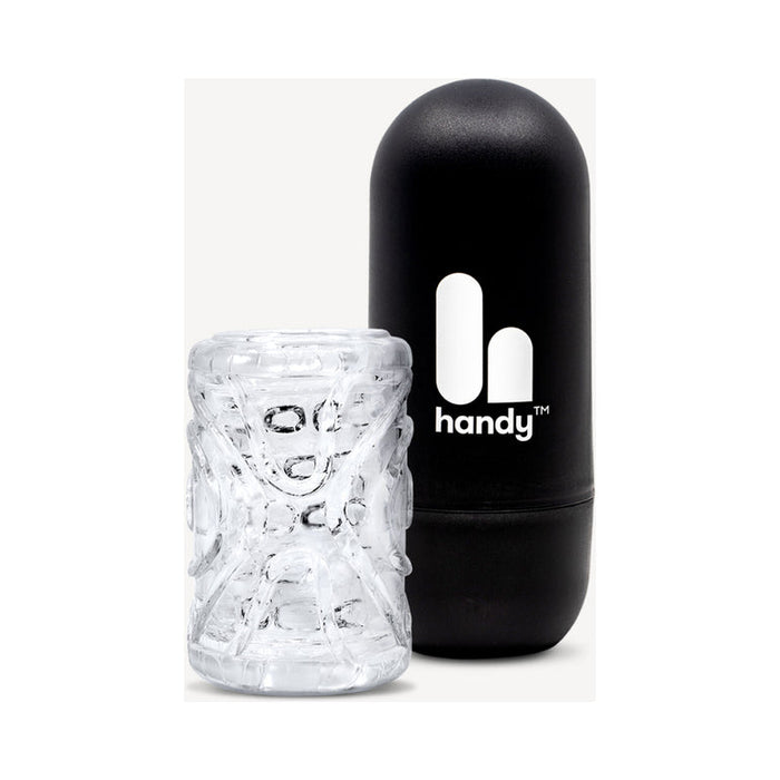The Handy Mermaid Collection Coral Sleeve - Intense Sensations features a transparent, textured cylindrical sleeve beside a black capsule case marked "handy" and logo in white, delivering intense stimulation.