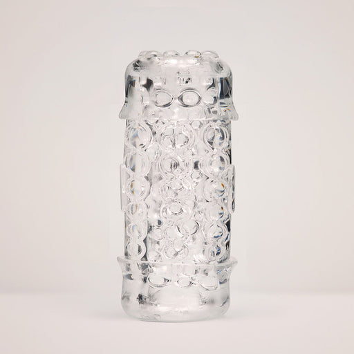 The Handy Mermaid Collection Pearl Sleeve stands upright against a plain, light background—a clear cylindrical glass piece featuring textured, bubble-like patterns reminiscent of real pearls.