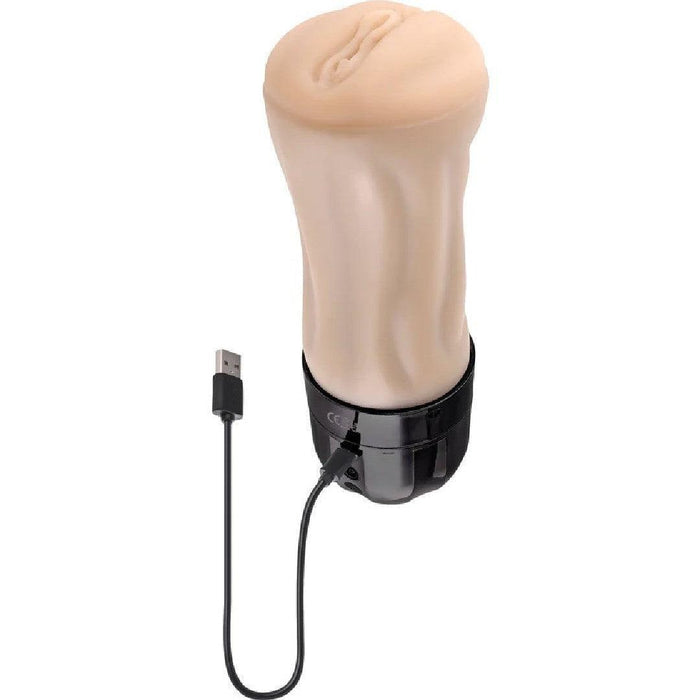 A beige, cylindrical electronic device with a textured surface, connected to a black base with a USB cable attached, featuring varying vibrating speeds for enhanced functionality is the Tight Lipped Vibrating Vanilla Stroker with Suction + Free Movie Download by XR Brands.