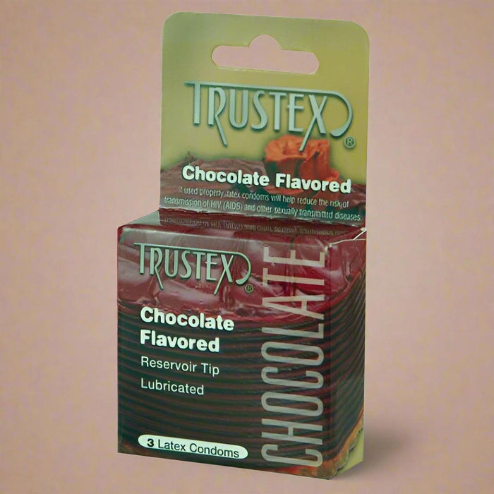 A small green and brown box of Trustex Flavored Condoms Chocolate 3 Pack, specifically the Trustex variety. The front of the box showcases features like "Reservoir Tip" and "Lubricated." Inside, you'll find 3 latex condoms.