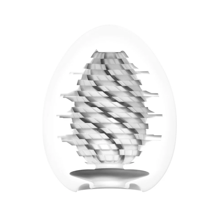 A modern abstract sculpture inspired by the Tenga Egg Disposable Penis Masturbator - Twister, featuring layered white segments spiraling within a translucent oval frame atop a small round base—a subtle homage to the iconic masturbation sleeve.