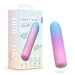 A pastel pink and blue Play With Me Berry Burst Soft Flexible Bullet Vibrator is shown next to its packaging, which highlights waterproof, body-safe silicone features with colorful text and icons.