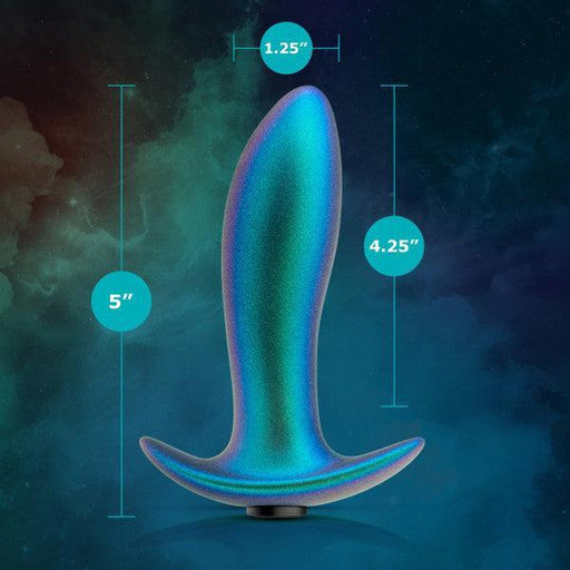 The Voyager Smooth Vibrating Butt Plug & Prostate Massager by Blush is an iridescent silicone anal toy designed in a plug shape. It boasts dimensions of 5 inches in height, with a width of 1.25 inches at the tip and expanding to 4.25 inches at its widest point. Set against a cosmic backdrop of swirling blue and green clouds, it presents an intriguing visual allure.