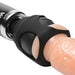 Close-up of the Wand Essentials Silicone Strap Cap Wand Harness For Dildos, connecting a realistic, flesh-toned toy to a textured black wand massager against a white background.